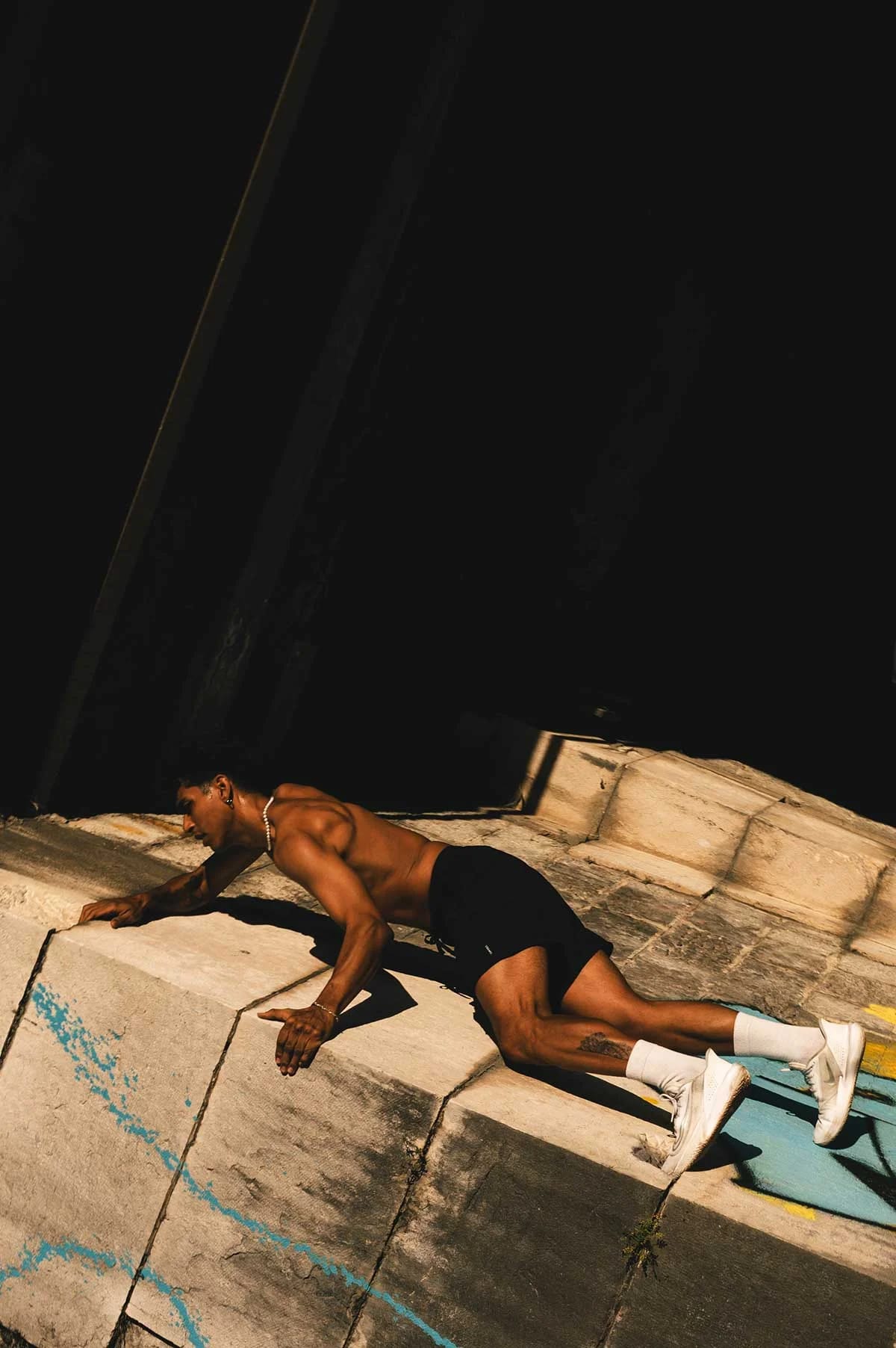 Parkour athlete climbing outdoors