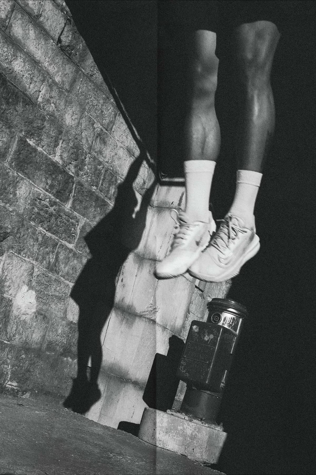 Legs hanging from a structure