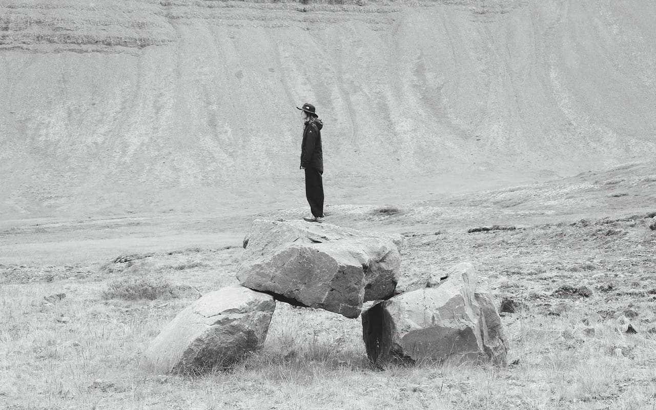 Woman on rocks in Iceland
