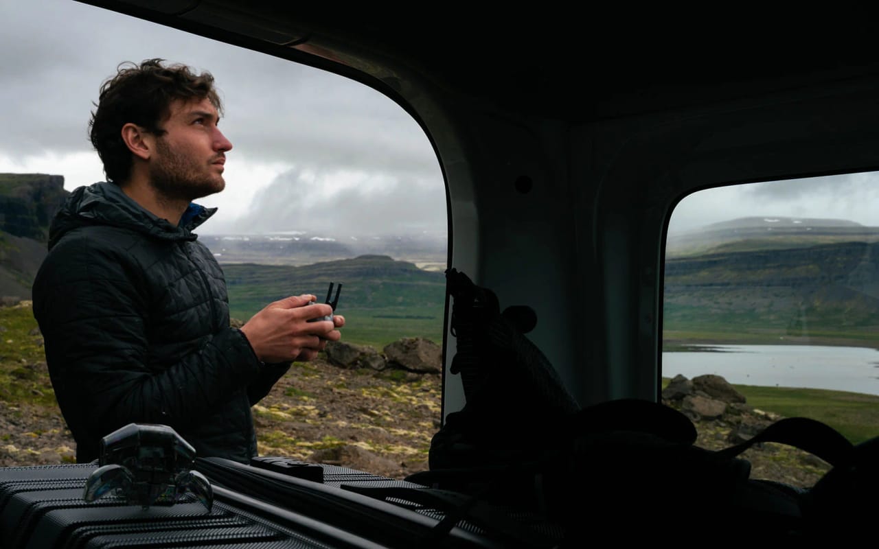 Filmmaker piloting a drone