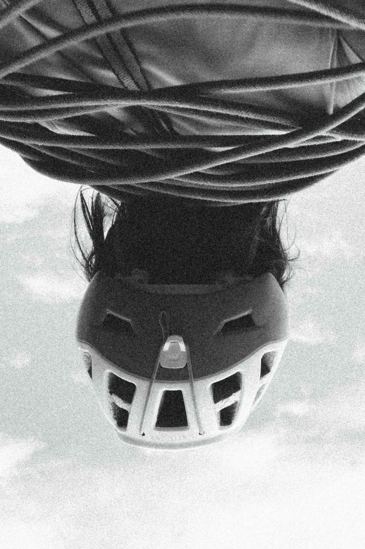 Woman with climbing helmet