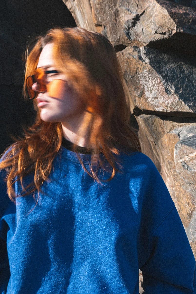 Red-haired girl looking to the right