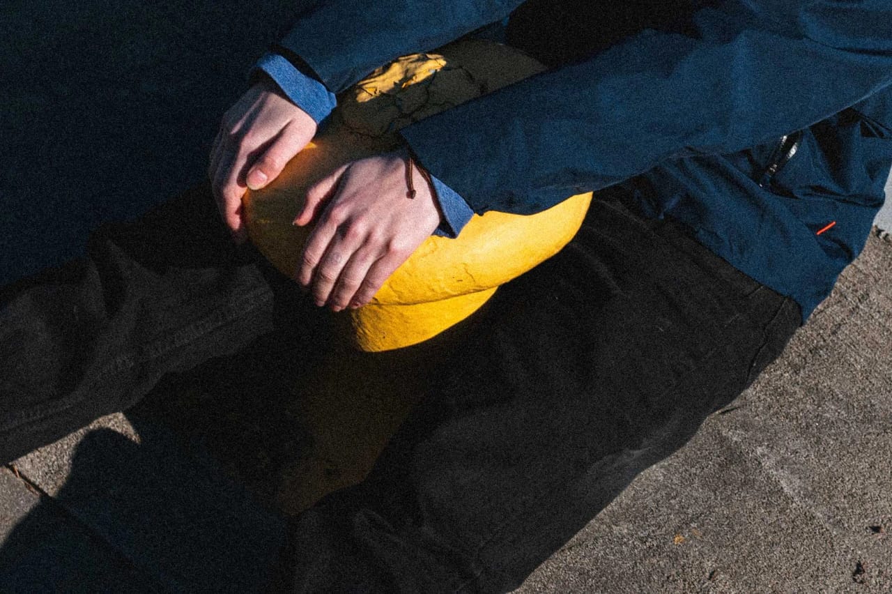 Girl holding a yellow structure